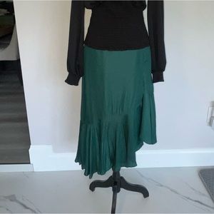 New, asymmetrical satin look skirt.